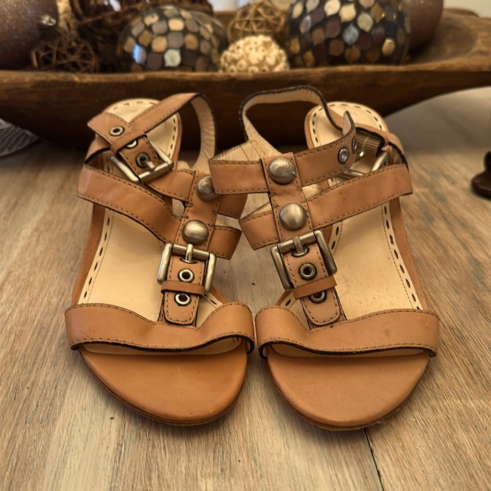Size 8, tan coach leather heels with silver studs